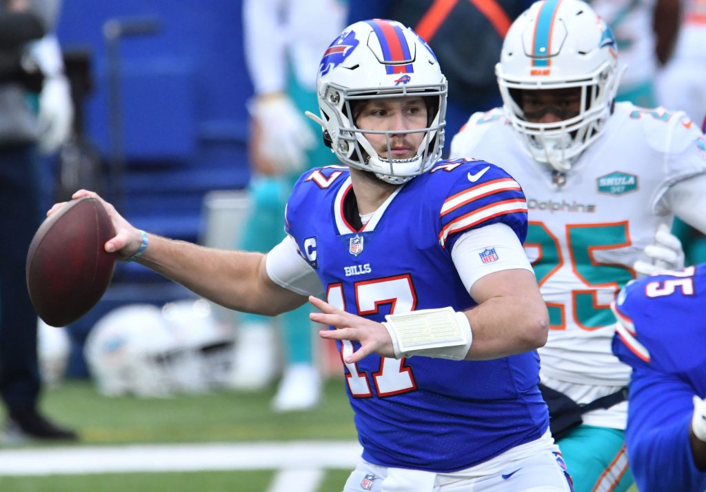 Buffalo Bills quarterback Josh Allen (17) throws a pass against the Miami Dolphins in the first quarter at Bills Stadium.