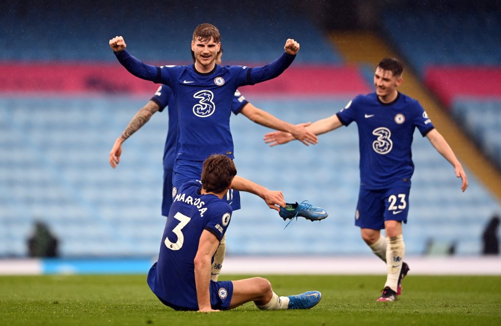 Chelsea’s Timo Werner celebrates with match winning goalscorer team-mate Marcos Alonso after the Premier League match at the Etihad Stadium, Manchester.