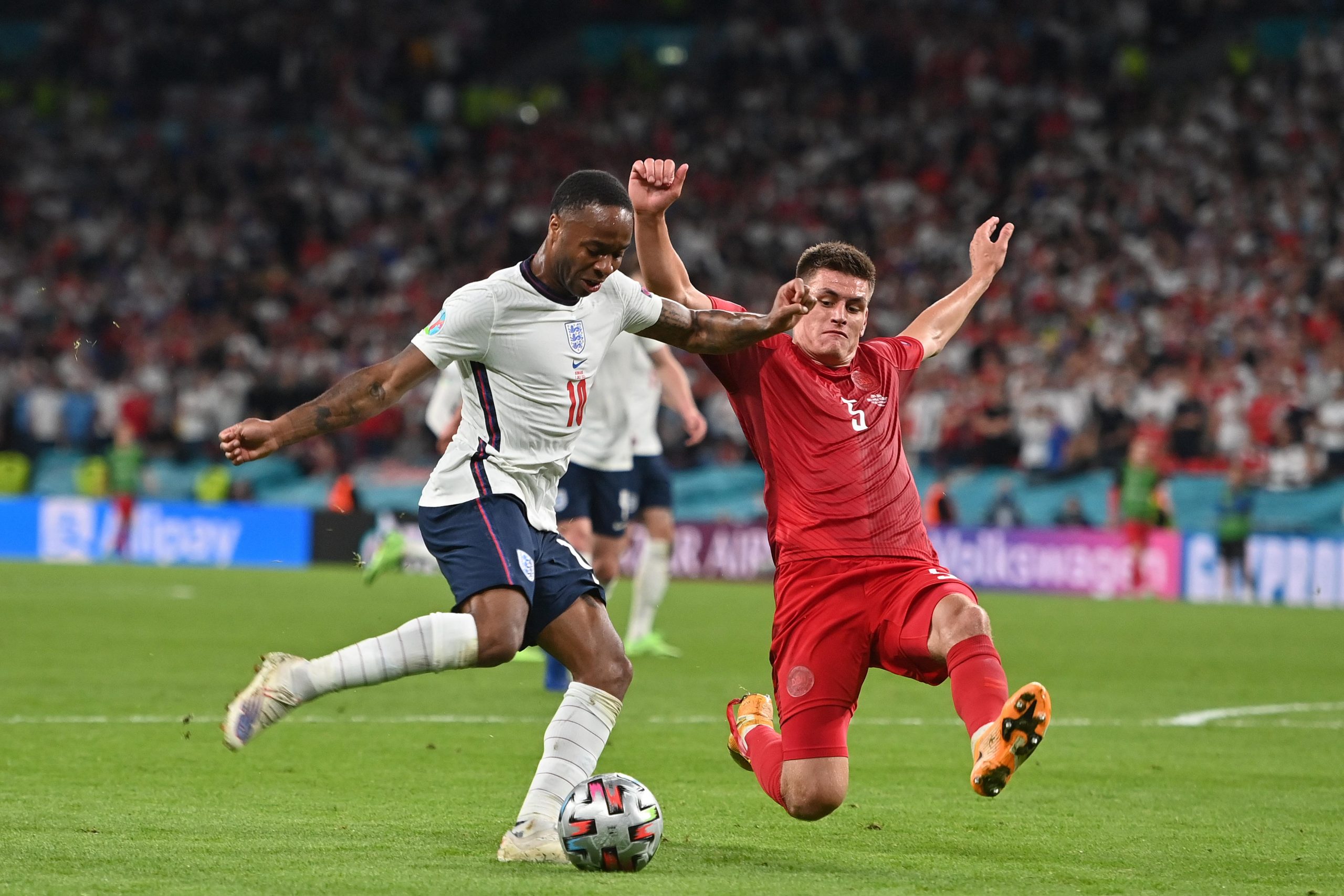 Raheem Sterling of England in action against Denmark at Euro 2020