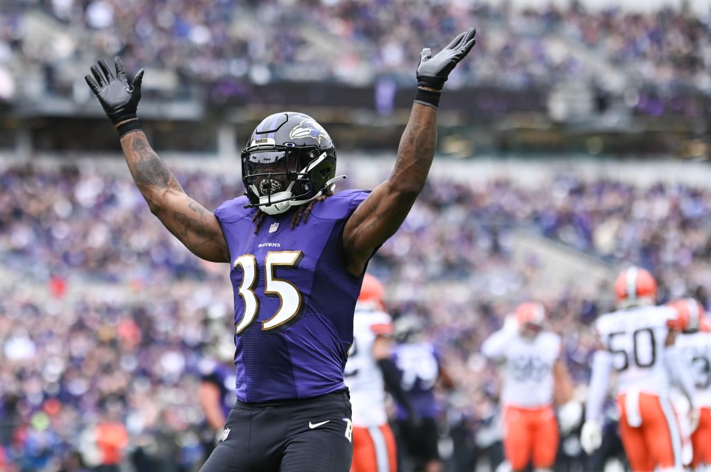 Baltimore Ravens running back Gus Edwards (35) reacts after scoring a second quarter touchdown against the Cleveland Browns at M&T Bank Stadium.
